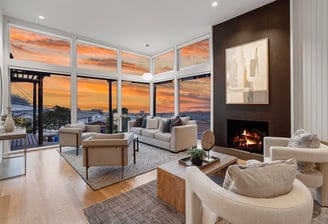 a living room with a fireplace and a fireplace