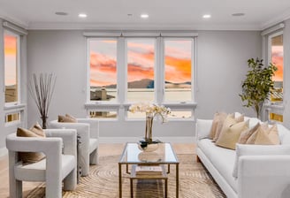 a living room with a couch and a table