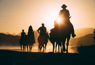 Horseback-riding-at-sunset