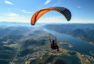 Man paragliding in the blue sky