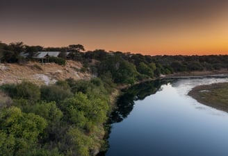 View over Meno-A-Kwena Tented Camp with the Boteti river Botswana