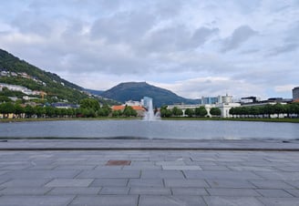 View of waterfall and lake in Byparken Bergen Norway