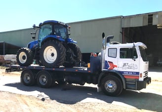 new tractor transport to buyer