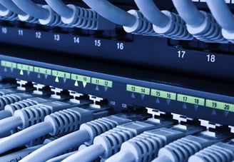 a bunch of cables connected to a computer and a bunch of wires