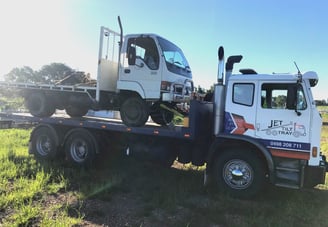 transporting small truck from farm