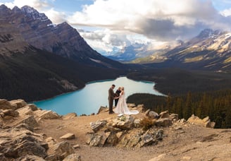 Bride and groom during their ceremony at peyto lake