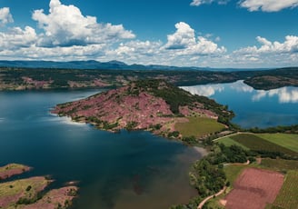 a lake with a mountain in the background