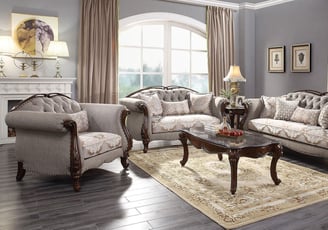 a living room with a hand carving sofa set and a table
