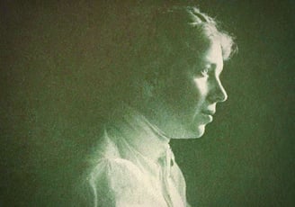 A grainy historical photo of a young and studious Harriet Brooks in profile