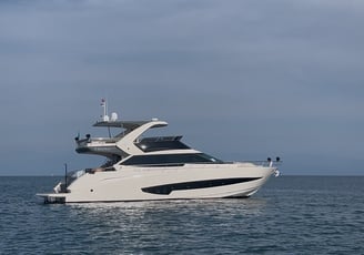 a boat in the water with a sky background