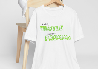 a white t - shirt with a green and white shirt with a wooden chair and