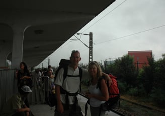 Nick and Tracey Billington on a train platform in China