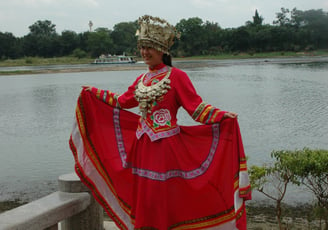 Traditional dress near the River at Guilin in China