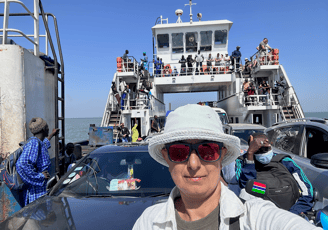 Zayera on a ferry border crossing Senegal to Gambia