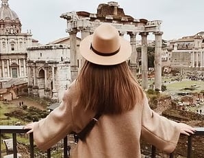 Traveller viewing an ancient ruin. Travel With Character Link.