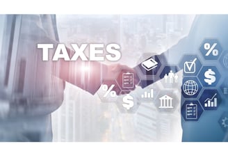 a business man shaking hands with a business woman, business tax services