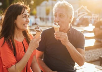 a man and woman eating ice creams