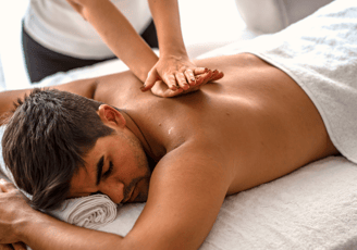 a man getting a massage at a massager