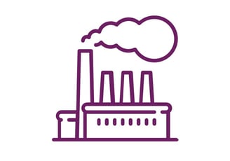 a factory with a factory with a large amount of smoke coming out of it