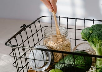 Healthy basket with oats, broccoli, avocado