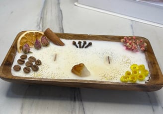 a dessert with a wooden tray with a spoon and a knife