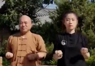 a man and woman doing taido exercises