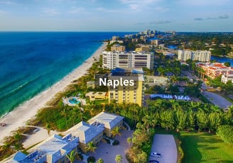 Beachfront aerial view in Naples Florida with oceanfront homes