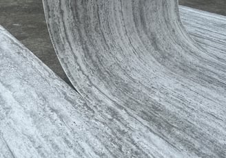 Close-up of Rome Travertine surface with realistic stone patterns, ideal for commercial wall deco