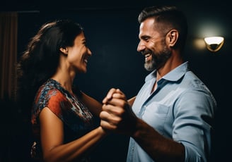 a man and woman dancing in a dark room