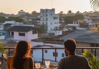 a couple admiring the town views of Shimoga from their apartment balcony