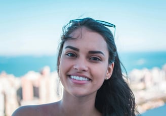 a woman with sunglasses and sunglasses on a sunny day