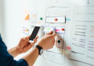 https://www.shutterstock.com/image-photo/web-designer-planning-application-mobile-phone-622216766
