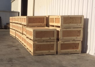 a bunch of wood plywood boxes stacked on top of each other