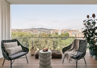 Private terrace with stunning views and outdoor seating, designed for RAMA in Barcelona Turo Park