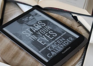 a book is sitting on a chair with a book and a book