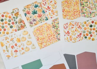 Cut apart autumn-themed craft paper featuring patterns of colorful fall season