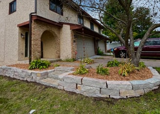 mulch-with-rock-retaining-wall.jpg