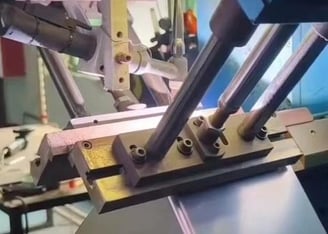 a laser machine that is welding the side edge of the handmade sink