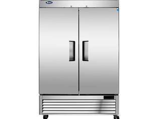 a refrigerator with a stainless steel refrigerator and a large freezer