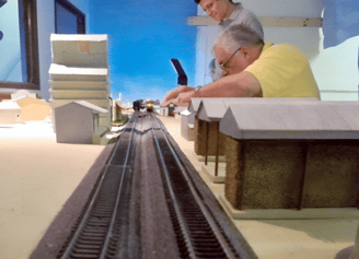 Building model train layout, father and son