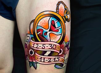 An american traditional tattoo of a pocket watch with an sand clock inside