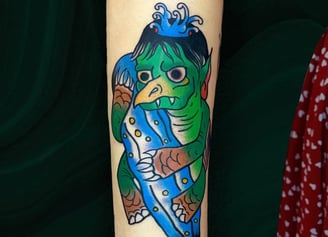 This is a traditional japanese tattoo of the Kappa but also with touch of cartoon style