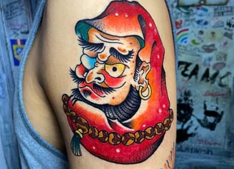 A traditional japanese tattoo of Daruma the Yokai