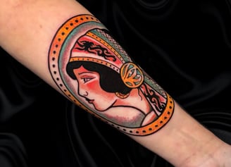 a traditional american tattoo of a woman face