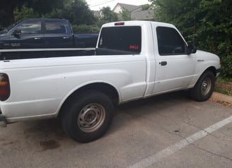 Junked white truck