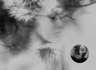 Dreamlike black and white portrait by Thuan Anh Nguyen, blending soft textures with a woman's face.