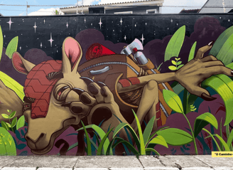 Levi Aquino conectou o tupi-guarani à arte urbana. Seu mural de 8,6x5,5m apresenta a frase "caminho
