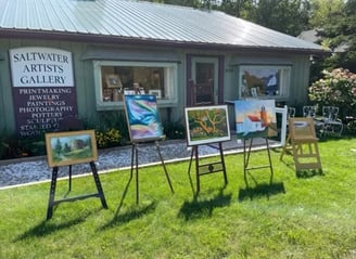 Saltwater Artists Gallery Paintings in the yard