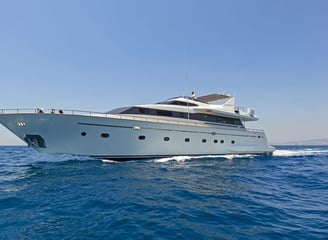 a large white yacht ON MYKONOS