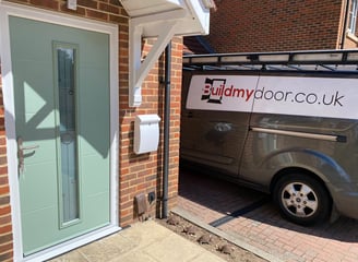a chart well green front door with long glass panel and the buildmydoor van